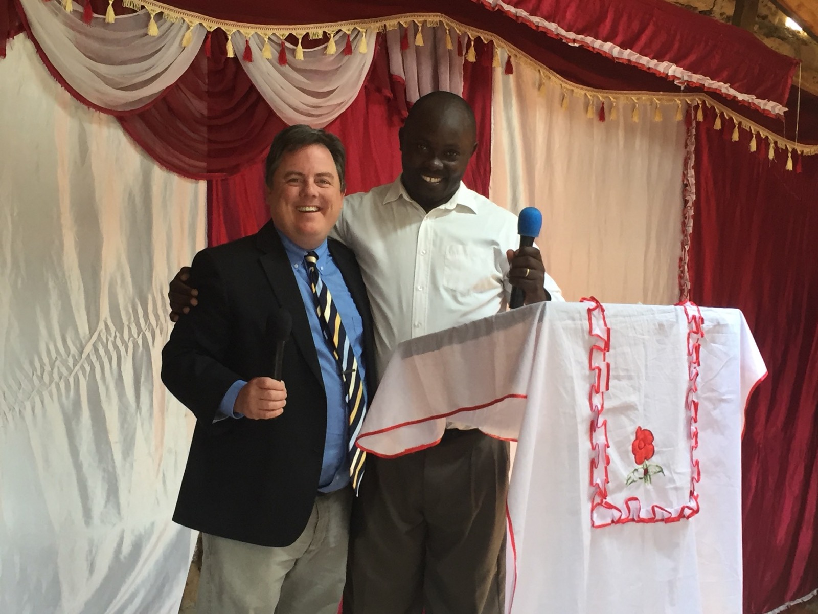 Chad with a pastor in a Kenyan church